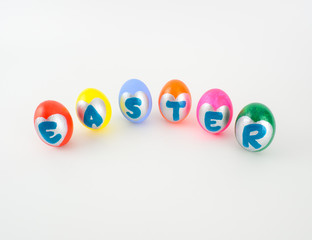 Easter eggs, colorful painted is letters in heart