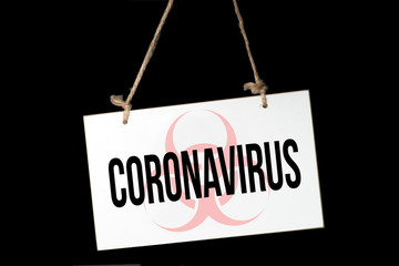 Ein Schild mit der Warnung vor Coronavirus