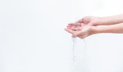 Woman washing hand with water isolated on white background. Good personal hygiene concept. First...