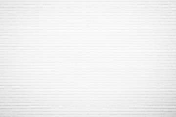 White brick wall texture background in room at subway. Brickwork stonework interior, rock old clean concrete grid uneven abstract weathered bricks tile design, horizontal architecture wallpaper.