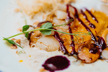 Scallop ceviche and foie gras with hazelnuts.