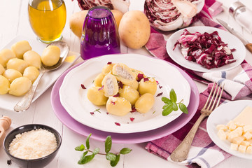 Potato gnocchi stuffed with radicchio and ricotta.