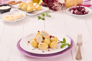 Potato gnocchi stuffed with radicchio and ricotta.