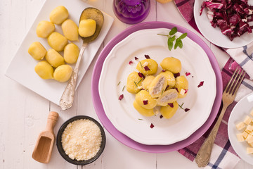 Potato gnocchi stuffed with radicchio and ricotta.