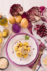 Potato gnocchi stuffed with radicchio and ricotta.