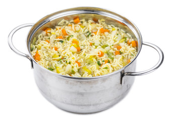 Alphabet Soup (selective focus) isolated on white background