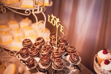 Candy bar. Table with sweets, candies, dessert