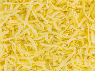 Fresh made Grated Cheese (close-up shot)
