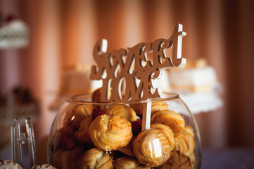 Candy bar. Table with sweets, candies, dessert