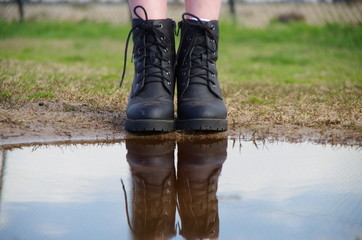 Boots near puddle