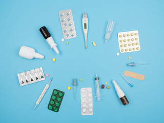 Medical items for the treatment of diseases on a blue background.