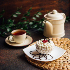 cup of coffee and cake on table