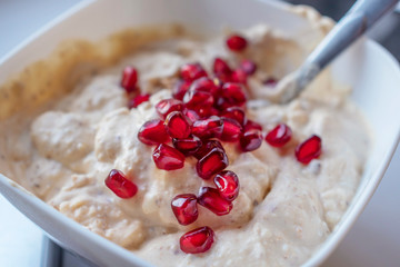  This is oatmeal with pomegranate.