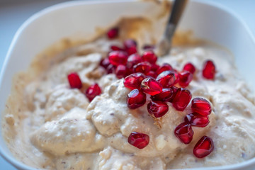  Oatmeal and pomegranate are for breakfast.