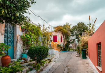 Fototapeta na wymiar Anafiotika, a scenic tiny neighborhood of Athens, Greece, part of the old historical neighborhood called Plaka, in northerneast side of the Acropolis hill.