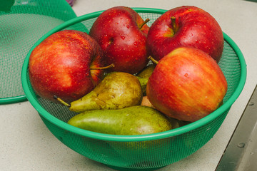fresh apples and pears in a bowl