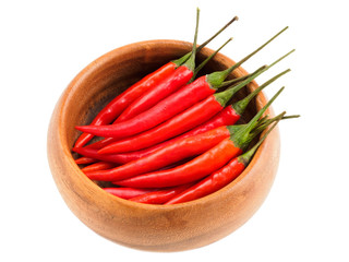 Red chili pods in wooden bowl isolated on white background. Indian cuisine, ayurveda, naturopathy concept