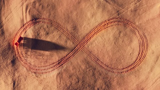 The modern pickup truck performs precision drifting in the desert drawing infinity sign with tire tracks. Seamlessly looping 3D animation with plenty of empty space for custom text.