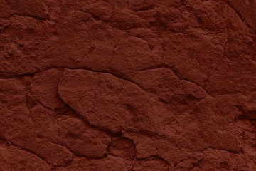 terracotta shabby stucco background with cracks