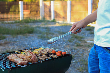 Barbeque Grill Street Food in thailand,Eat outdoors in a happy family.