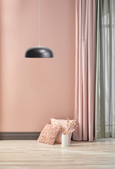 Pink wall background and lamp concept interior room.