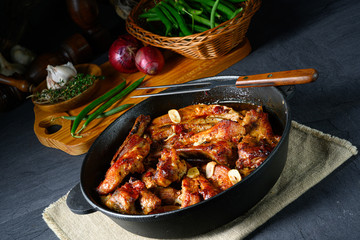 Spicy pork ribs with garlic and barbecue sauce