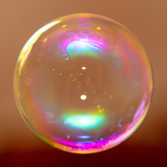 Soap bubble flies in the house.