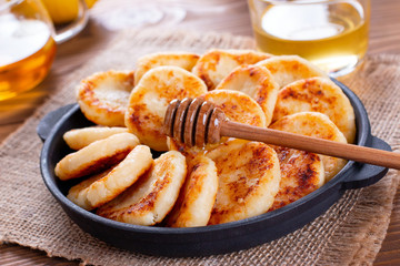 Cottage cheese pancakes with honey