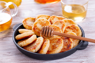 Cottage cheese pancakes with honey