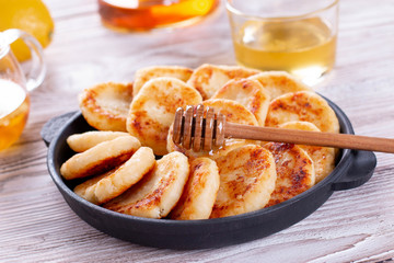 Cottage cheese pancakes with honey