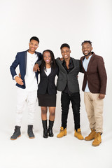 team of young african people in suits on a white background with phones in their hands