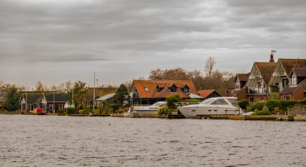 Luxury riverside rental properties and holiday homes on the bank of the River Bure in the village of Horning