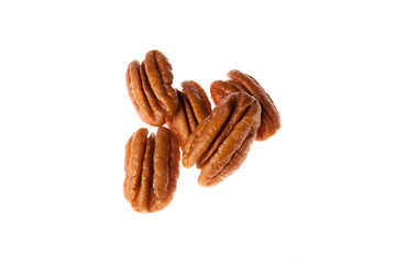Brown pecan nut isolated on white background. Healthy and diet food.