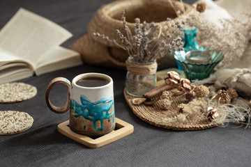 Still life in a cozy room with a beautiful Cup.