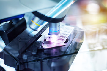 Close up microscope in laboratory.