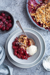 cherry crumble pie served with vanilla ice cream