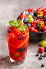A refreshing drink made from fresh summer berries with lemon and mint.