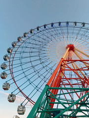 ferris wheel on blue sky