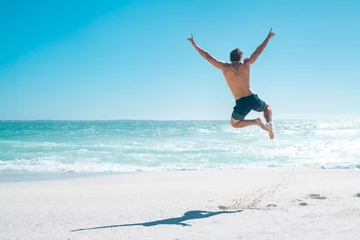 Foto op Plexiglas Jumping in joy for vacation © Rido