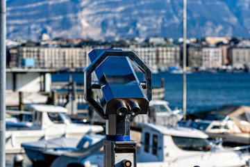 Tourist binoculars on the shores of Lake Geneva, Geneva, Switzerland