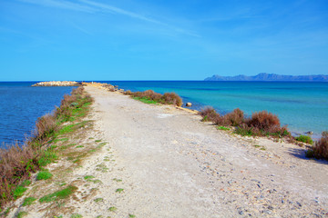 Fototapeta na wymiar coastal path between sea water 