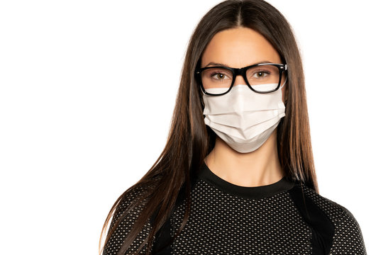 Beautiful young woman with protective mask on her face