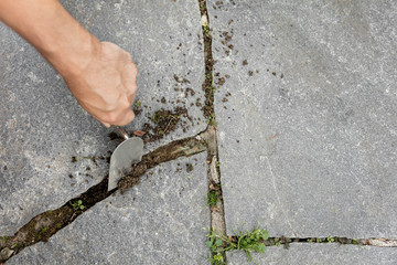 joints beeing cleaned with a crack weeder