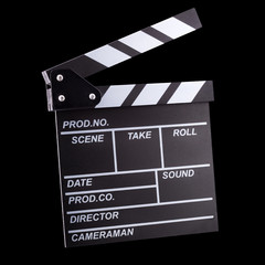 Fototapeta na wymiar Film clapper board isolated on black background with clipping path