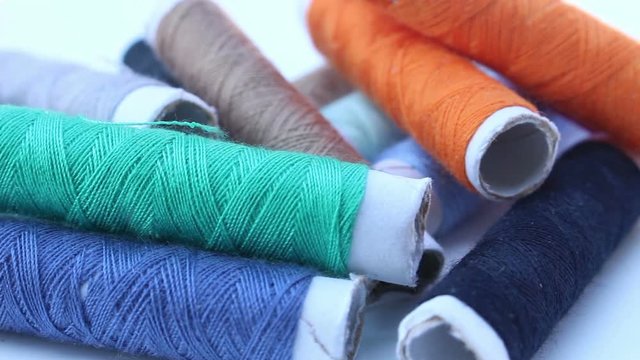 roll of thread rotate background