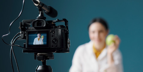 Professional nutritionist making a video blog