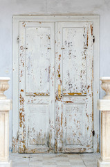 Closeup view of an old white door on Adriatic coast.