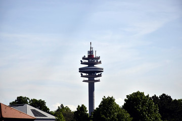 Obraz premium Top of the Arsenalturm with logo of A1 Telekom against the blue sky.