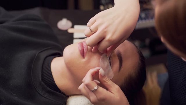 Closeup of eyelash extension glue patches