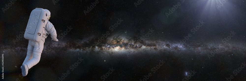 Canvas Prints astronaut in outer space flying towards the milky way galaxy